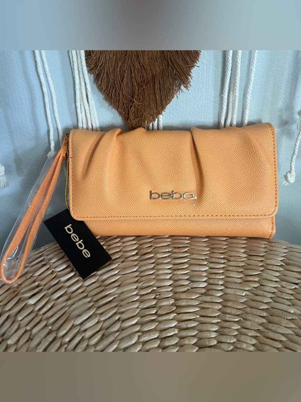 bebe orange Wristlet Clutch